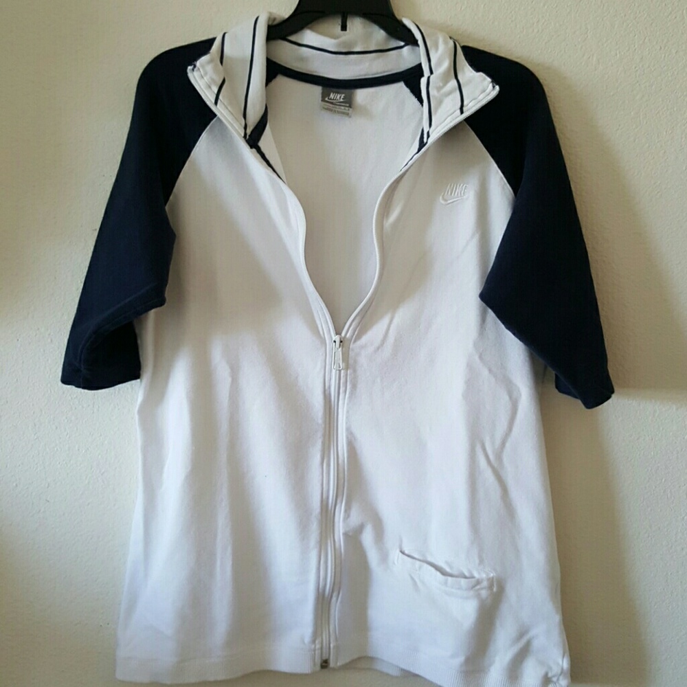 Nike zip up athletic top. 1/2 sleeve. Size L